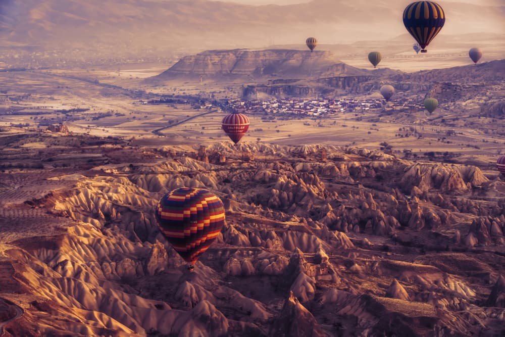 Hot Air Balloons Over Cappadocia by mihai ian nedelcu — canvas wall art