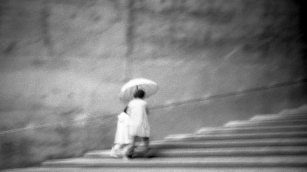 Blurred Umbrella Climb by Parole Kim — canvas wall art