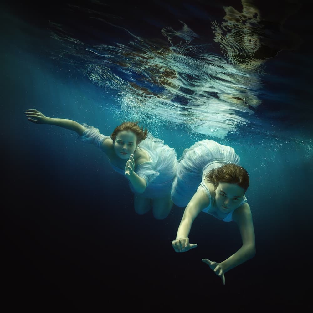 Graceful Underwater Women by Dmitry Frizel — canvas wall art