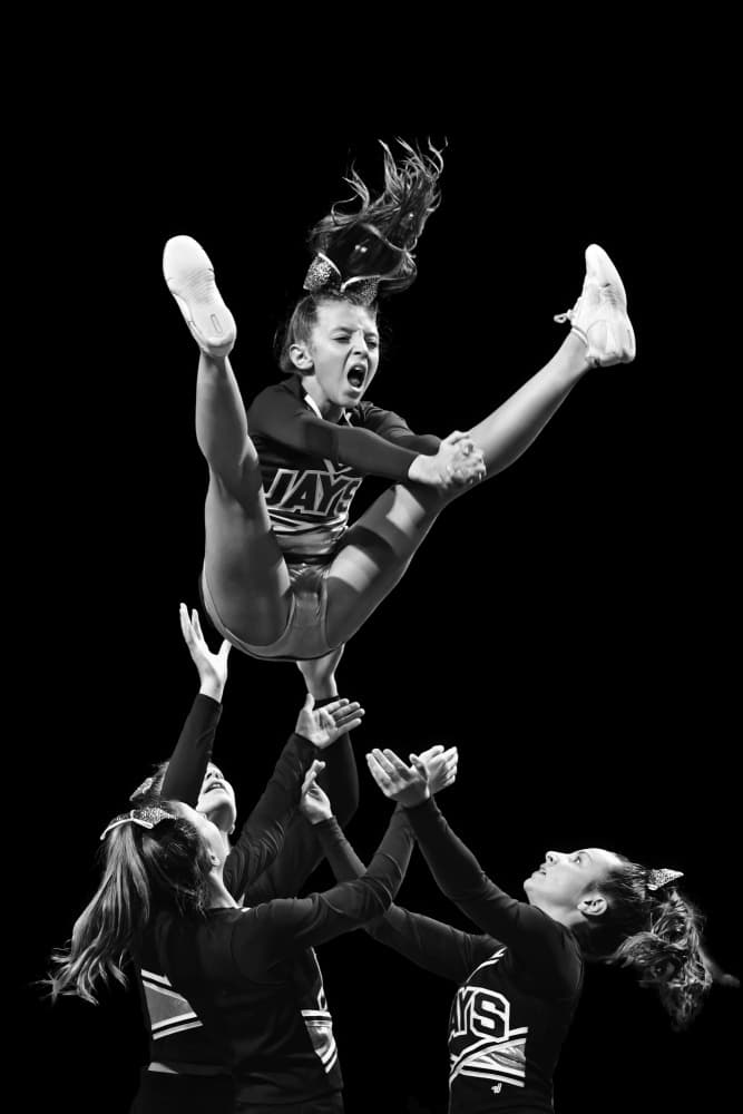 High Flying Cheer Stunt by Rob Li — canvas wall art