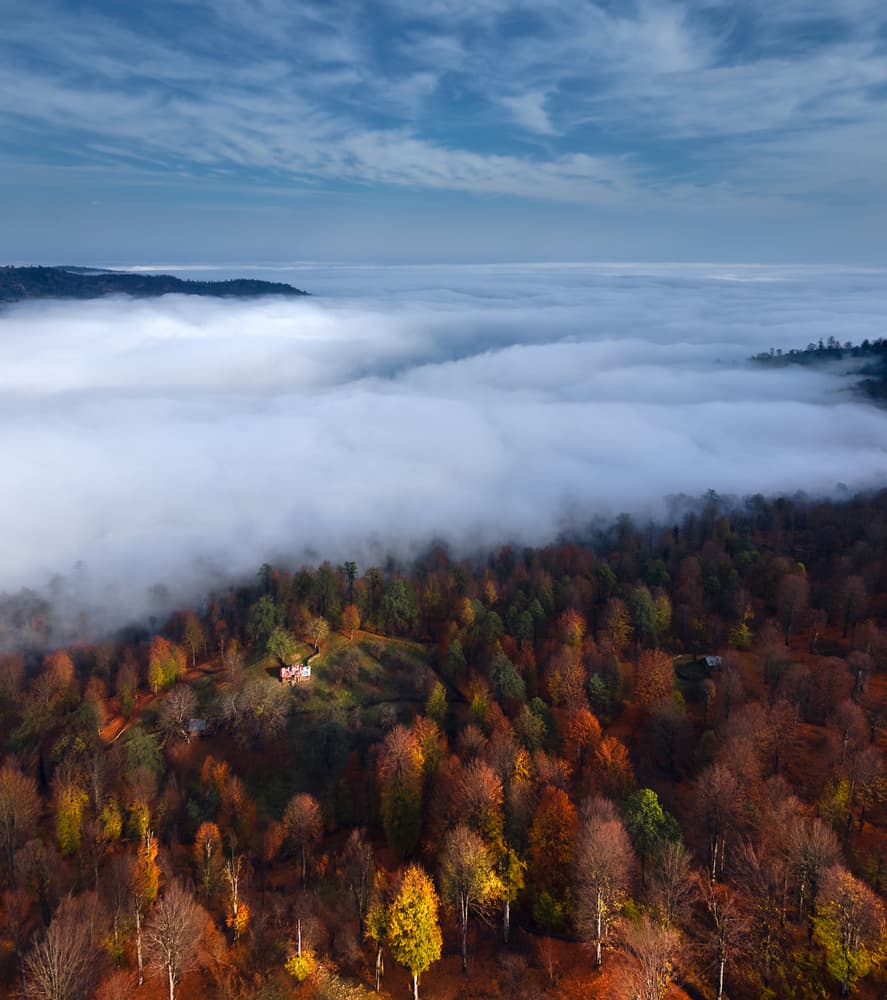 Mountain Cabin Above The Clouds by Majid Behzad — canvas wall art
