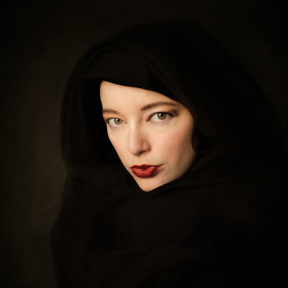 Mysterious Woman's Gaze by Colin Dixon — canvas wall art