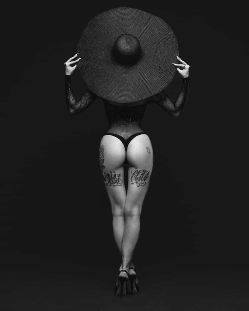 Mysterious Woman In Hat by Denis — canvas wall art