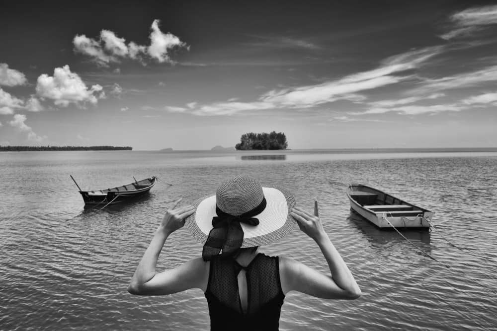 Woman Facing Tropical Ocean by Kieron Long — canvas wall art