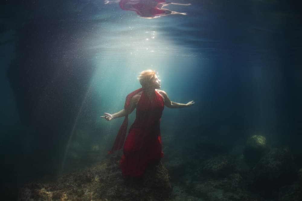 Woman In Red Underwater by Davide Lopresti — canvas wall art