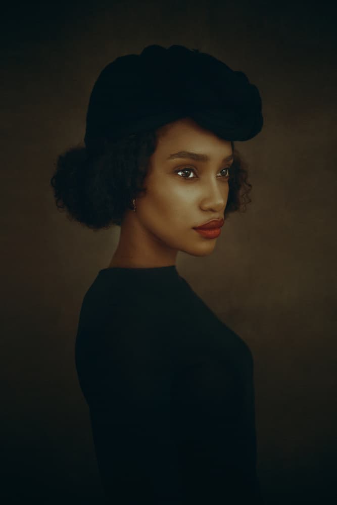 Elegant Woman In Hat by Raluca Arhire — canvas wall art