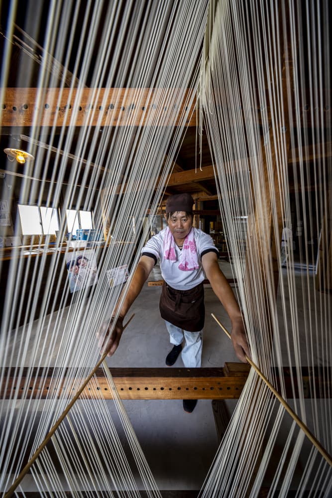 Artisan Stretching Noodles by Raimondo Restelli — canvas wall art