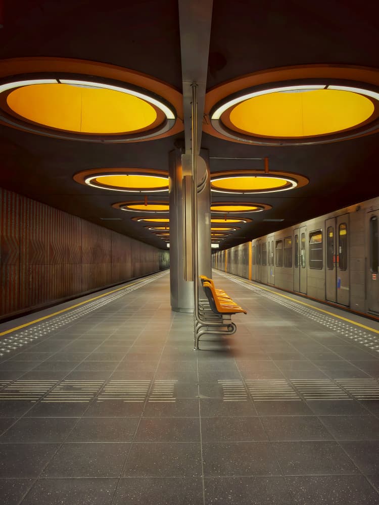 Orange Lit Metro Station by Frank Bruynseraede — canvas wall art