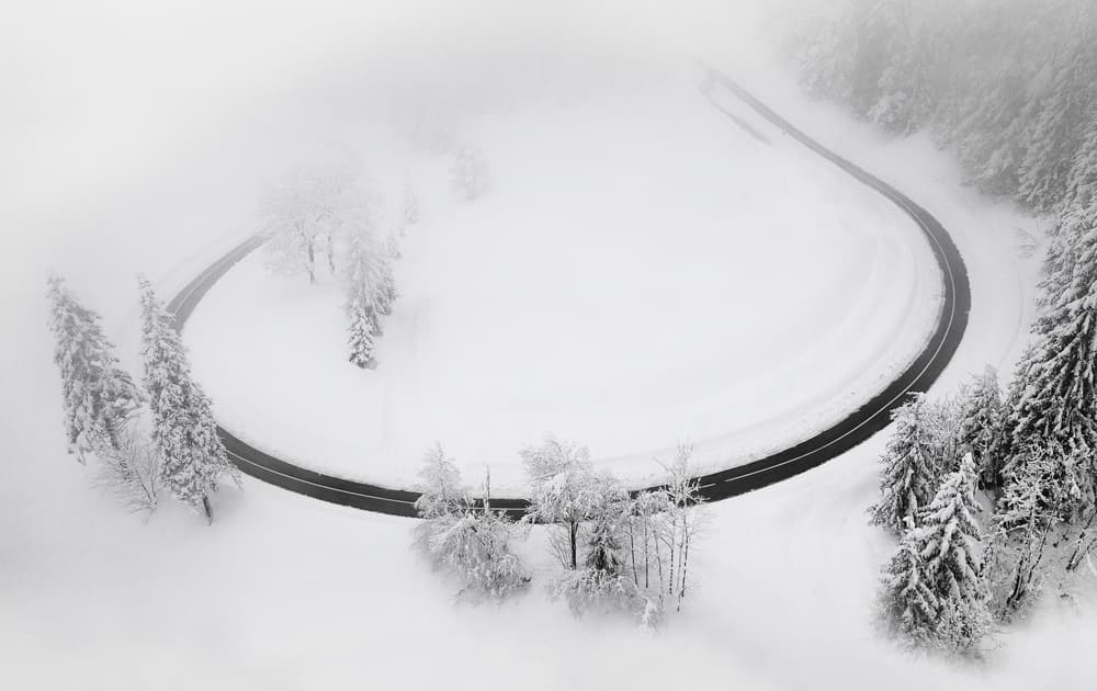 Winding Winter Road by Ales Krivec — canvas wall art