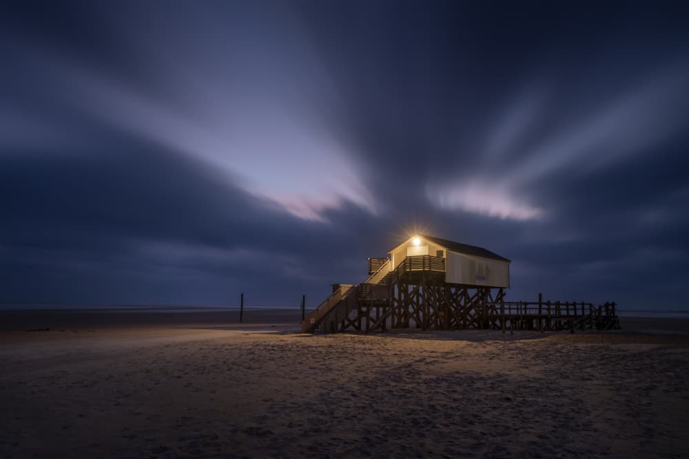 Stilt House Night Glow by fotomarion — canvas wall art
