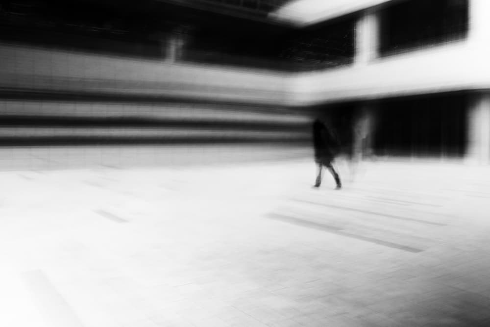 Blurred Figure Walking by Swen MUN — canvas wall art