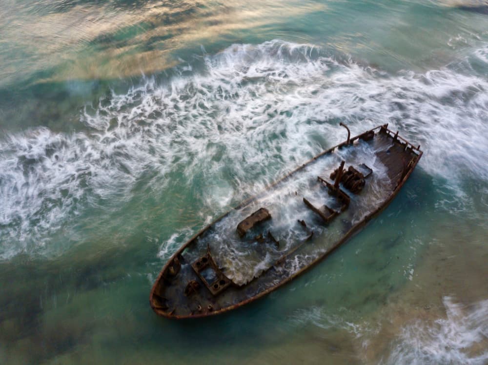 Ocean Waves Shipwreck by eMunther — canvas wall art