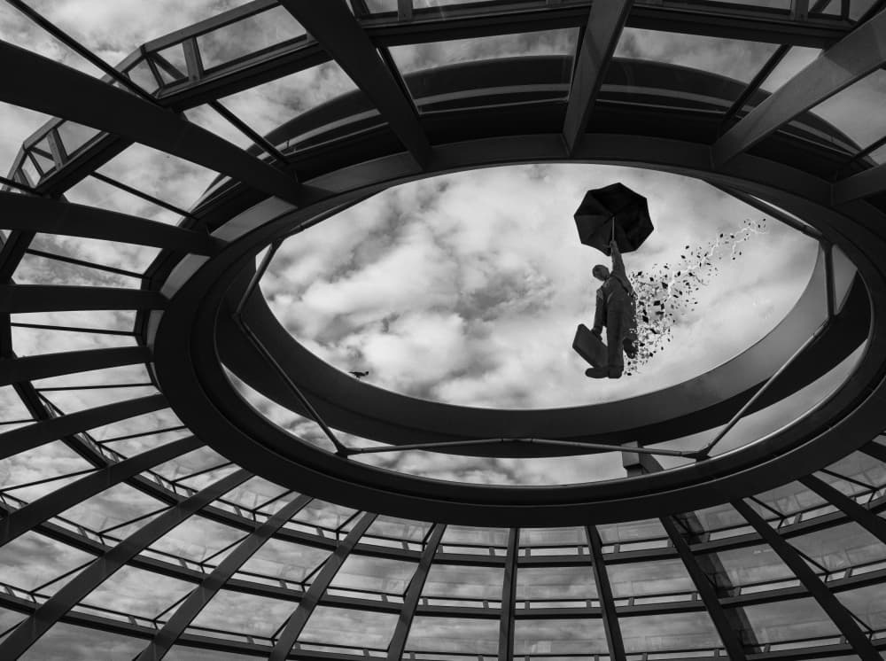 Umbrella Man's Surreal Flight by Yi Pan — canvas wall art