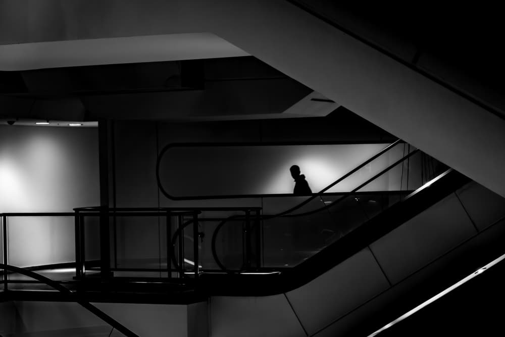 Shadow On Escalator by Heike Wolters-Wrase — canvas wall art