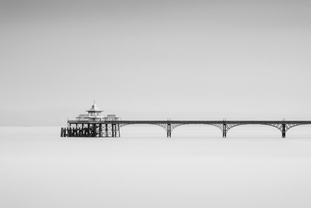 Pier At Tranquil Ocean by Robert Bolton — canvas wall art
