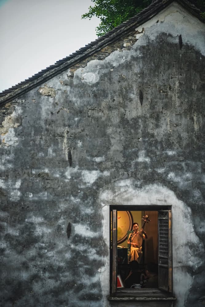 Traditional Window Musician by Yi-Tang Wang — canvas wall art