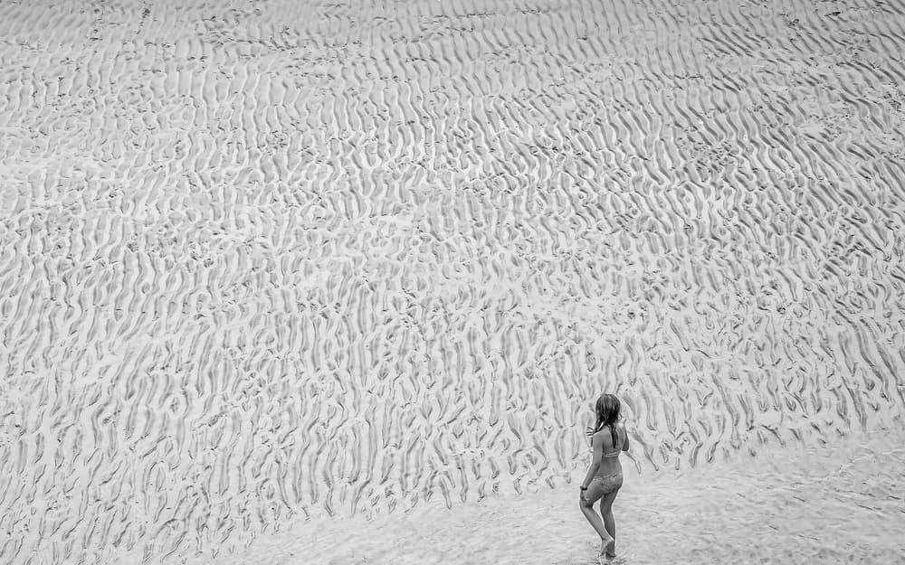 Solitary Walk on Rippled Sand by Gloria Salgado Gispert — canvas wall art