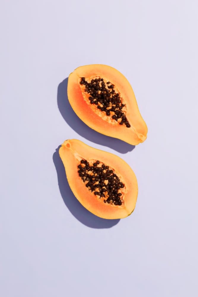 Fresh Papaya Halves by Pictufy Studio III — canvas wall art