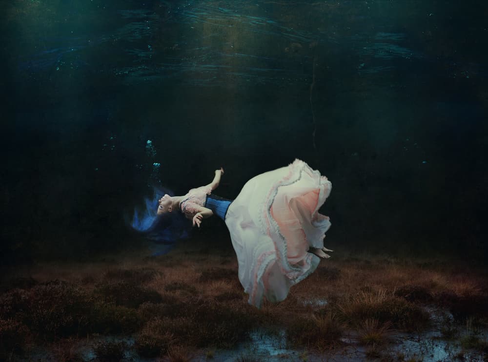 Floating Dreamer Underwater by Magdalena Russocka — canvas wall art