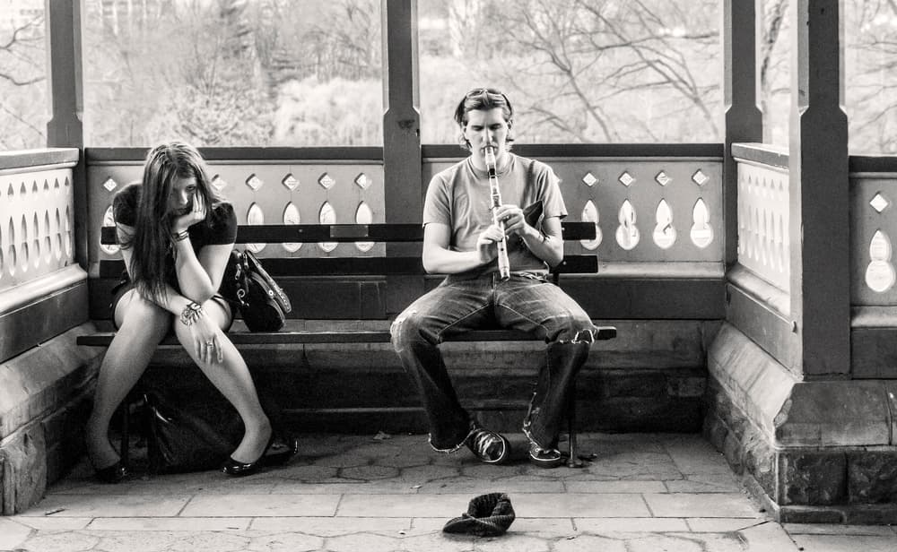 Flute Player Park Bench by Milton Mpounas — canvas wall art
