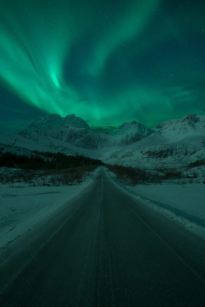 Northern Lights Winter Road by Carlos Gonzalez — canvas wall art