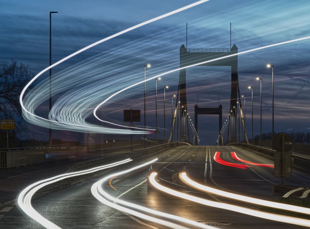 Night Bridge Light Trails by Erhard Batzdorf — canvas wall art