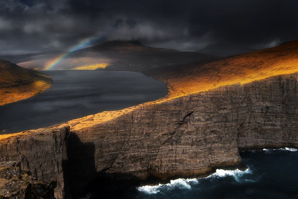 Dramatic Cliffs Rainbow by Mozart Chan — canvas wall art
