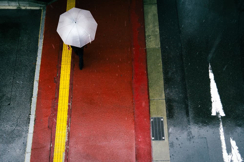 White Umbrella Red Street by Tetsuya Hashimoto — canvas wall art