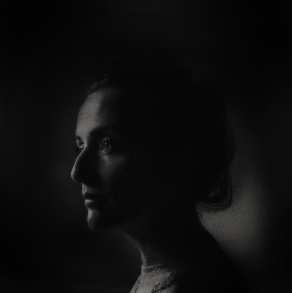 Thoughtful Woman In Profile by Yuri Shepelev — canvas wall art