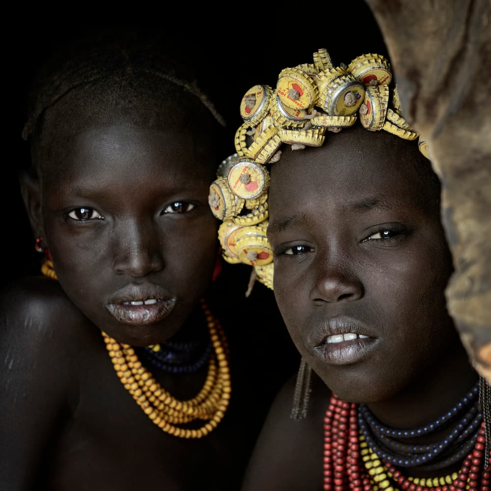 Girls With Bottlecap Crown by Mohammed Al Sulaili — canvas wall art