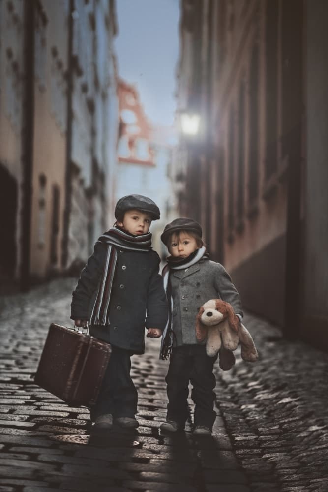 Young Travelers Cobblestone Alley by Tatyana Tomsickova — canvas wall art