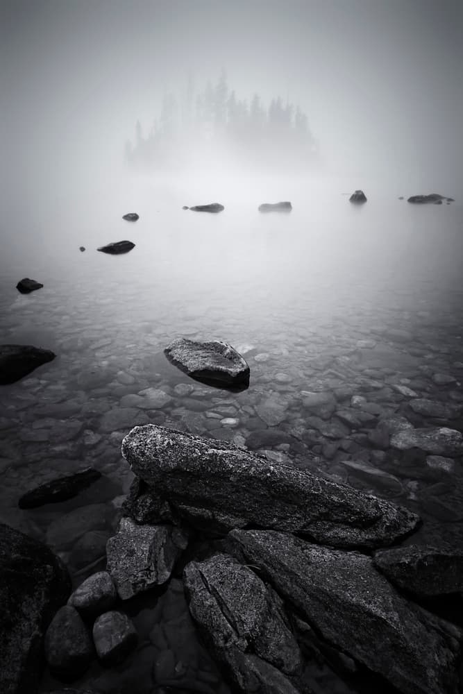 Misty Lake Rocks by Lydia Jacobs — canvas wall art