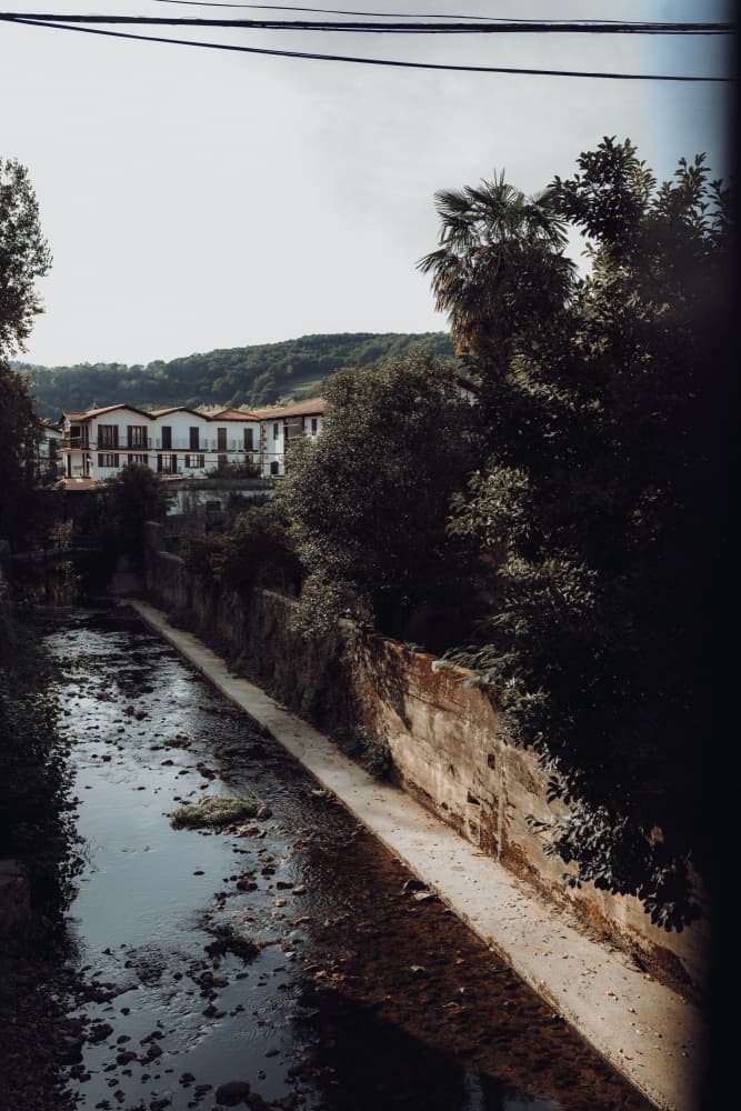 River Through Old Town by Aimee Giles — canvas wall art