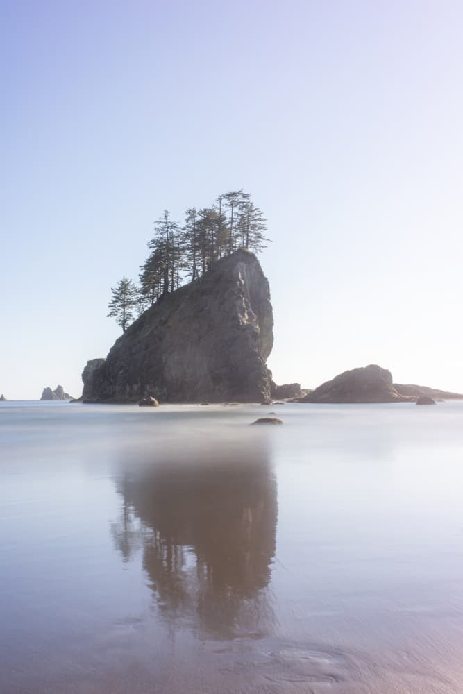 Pacific Sea Stack Reflection by Lynann Colligan — canvas wall art