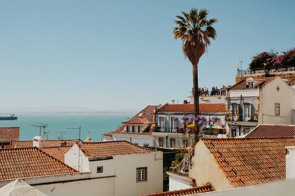 Sunny Coastal City View by Del Mundo Imagery — canvas wall art