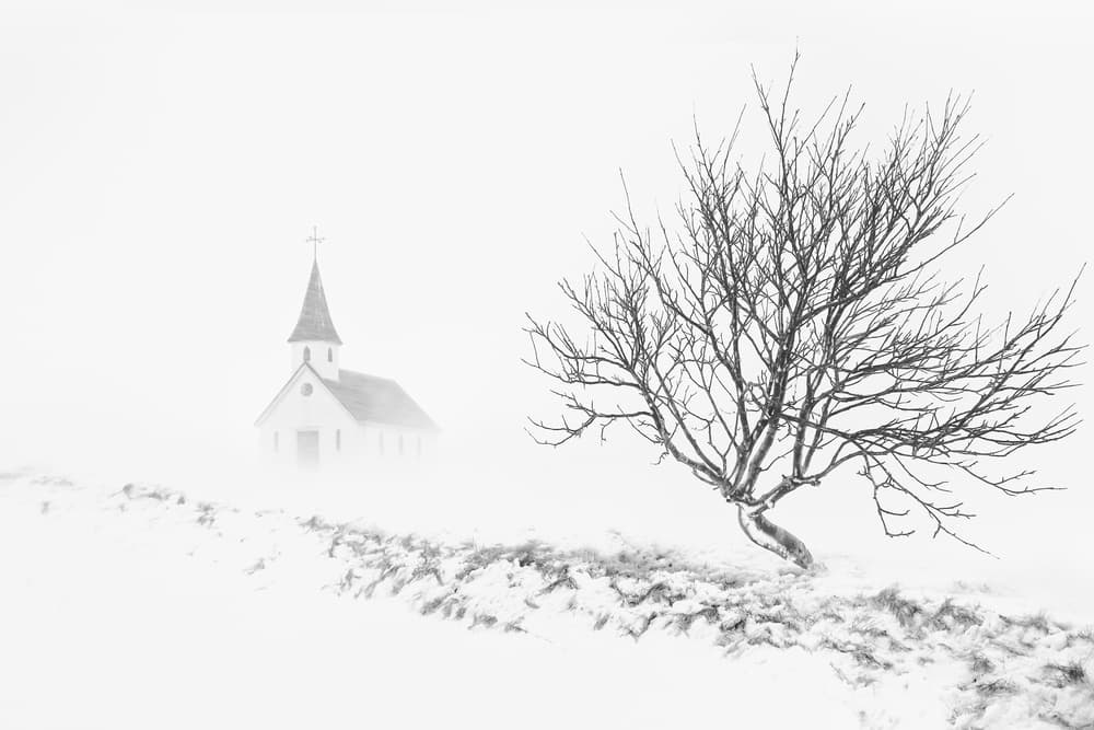 Isolated Winter Church by Tony Xu — canvas wall art