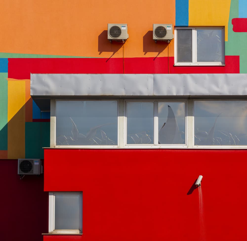 Vibrant Geometric Building by Peter Hrabinsky — canvas wall art