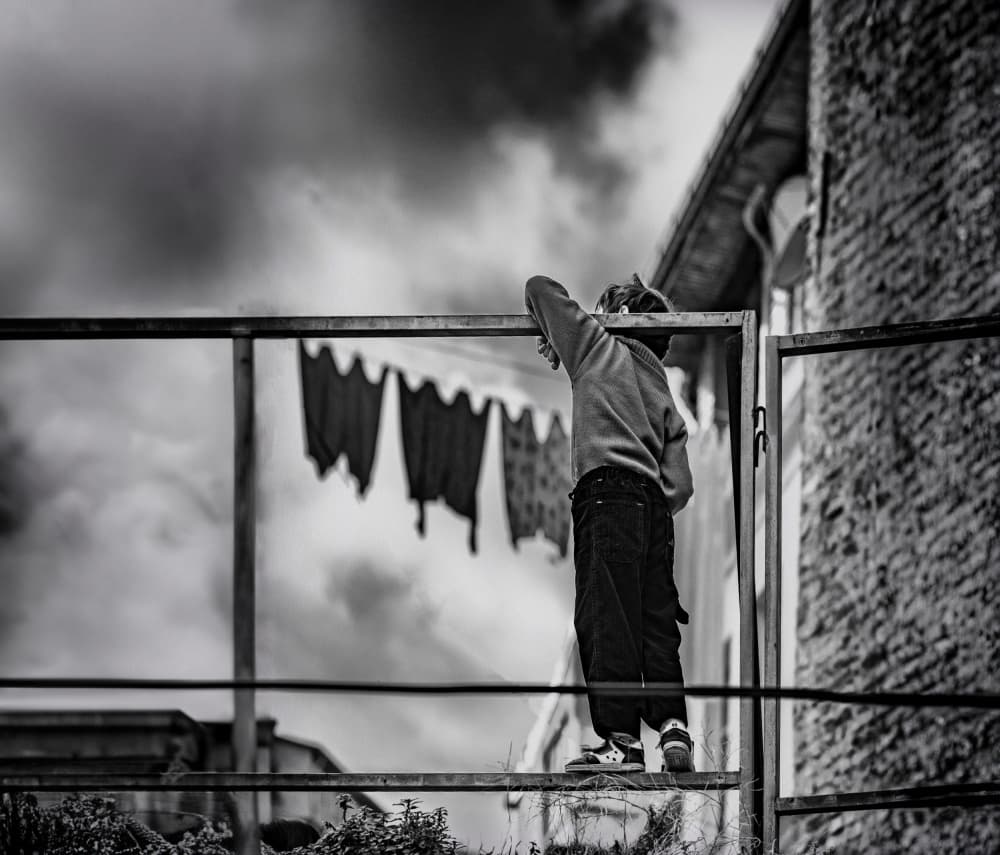 Curious Boy Cityscape by Ömer Ates Kızıltug — canvas wall art