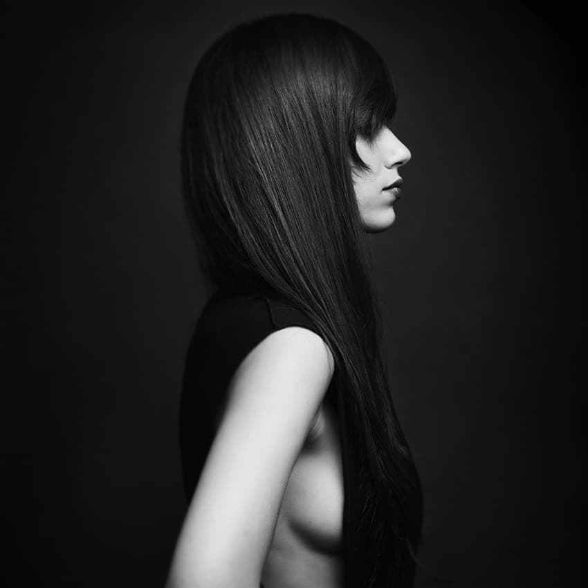 Contemplative Woman Profile by Oren Hayman — canvas wall art