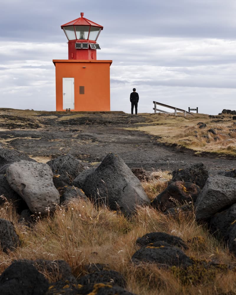 Man by Orange Lighthouse by Wanjae Choi — canvas wall art