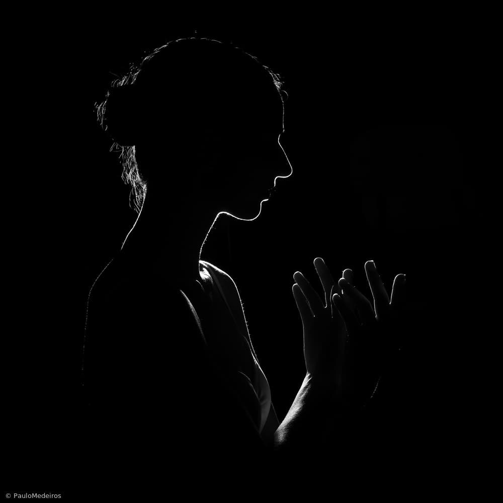 Praying Woman Silhouette by Paulo Medeiros — canvas wall art