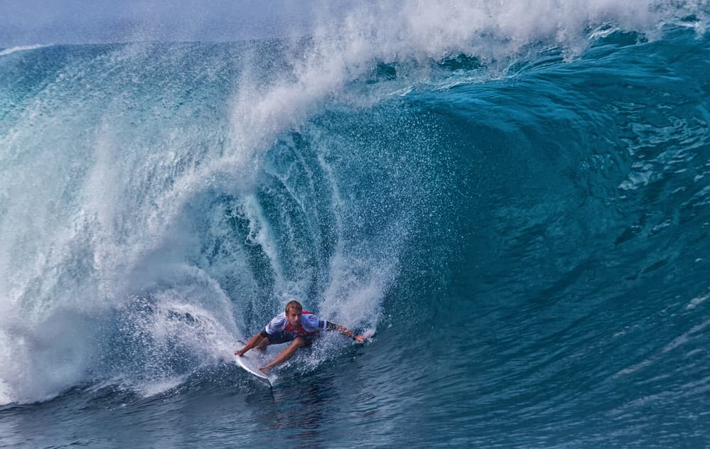Surfer Rides Tube Wave by Cheng Chang — canvas wall art