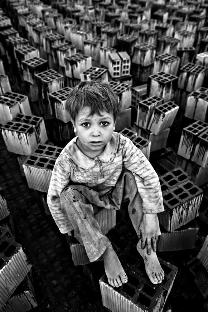 Somber Young Boy by Mohammadreza Momeni — canvas wall art