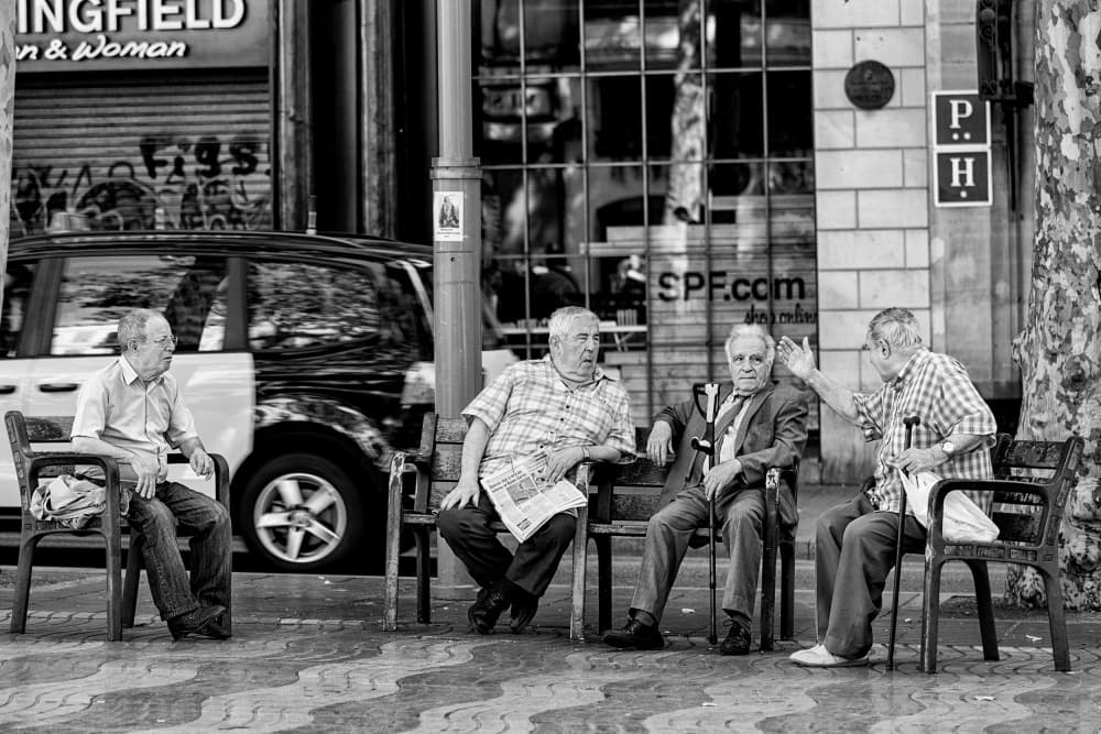 Elderly Men Conversing by Andreas Klesse — canvas wall art