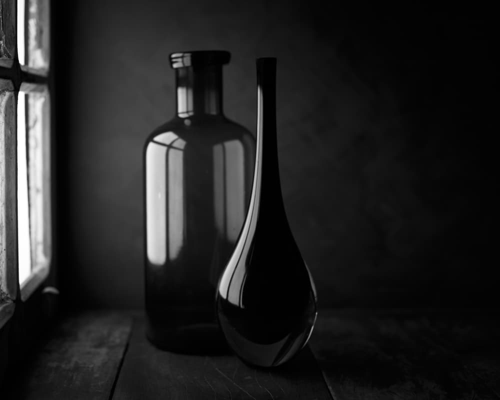 Elegant Bottles in Window Light by Luiz Laercio — canvas wall art
