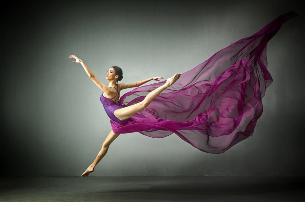 Graceful Purple Leap by Angela Muliani Hartojo — canvas wall art