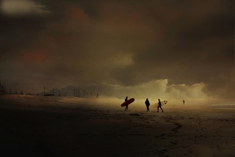 Surfers Dark Beach Waves by Elena Arjona — canvas wall art