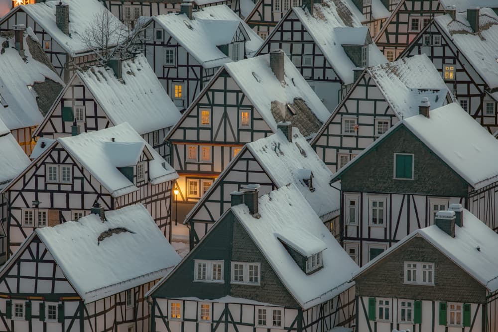 Snowy Half-Timbered Village by Thomas Siegel — canvas wall art
