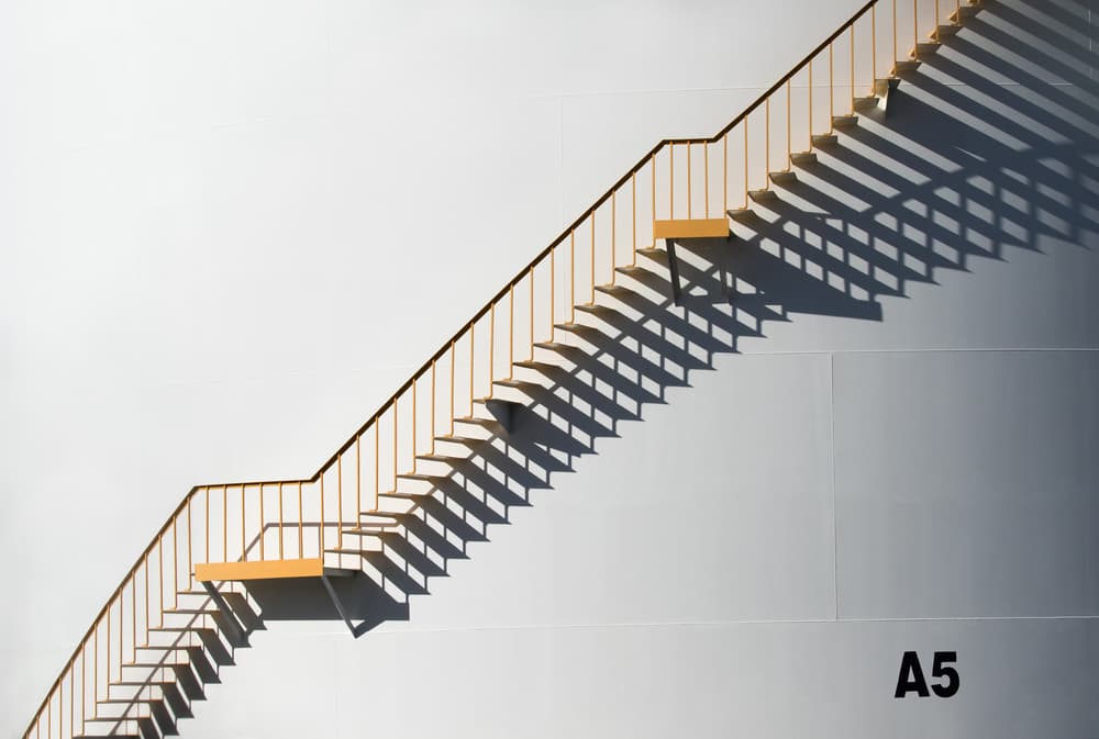 Geometric Stair Shadows by Jacqueline Hammer — canvas wall art