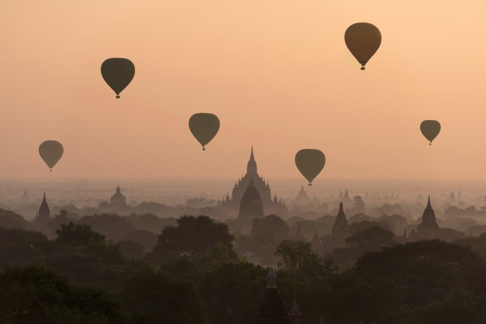 Bagan Sunrise Balloons by Sarawut Intarob — canvas wall art